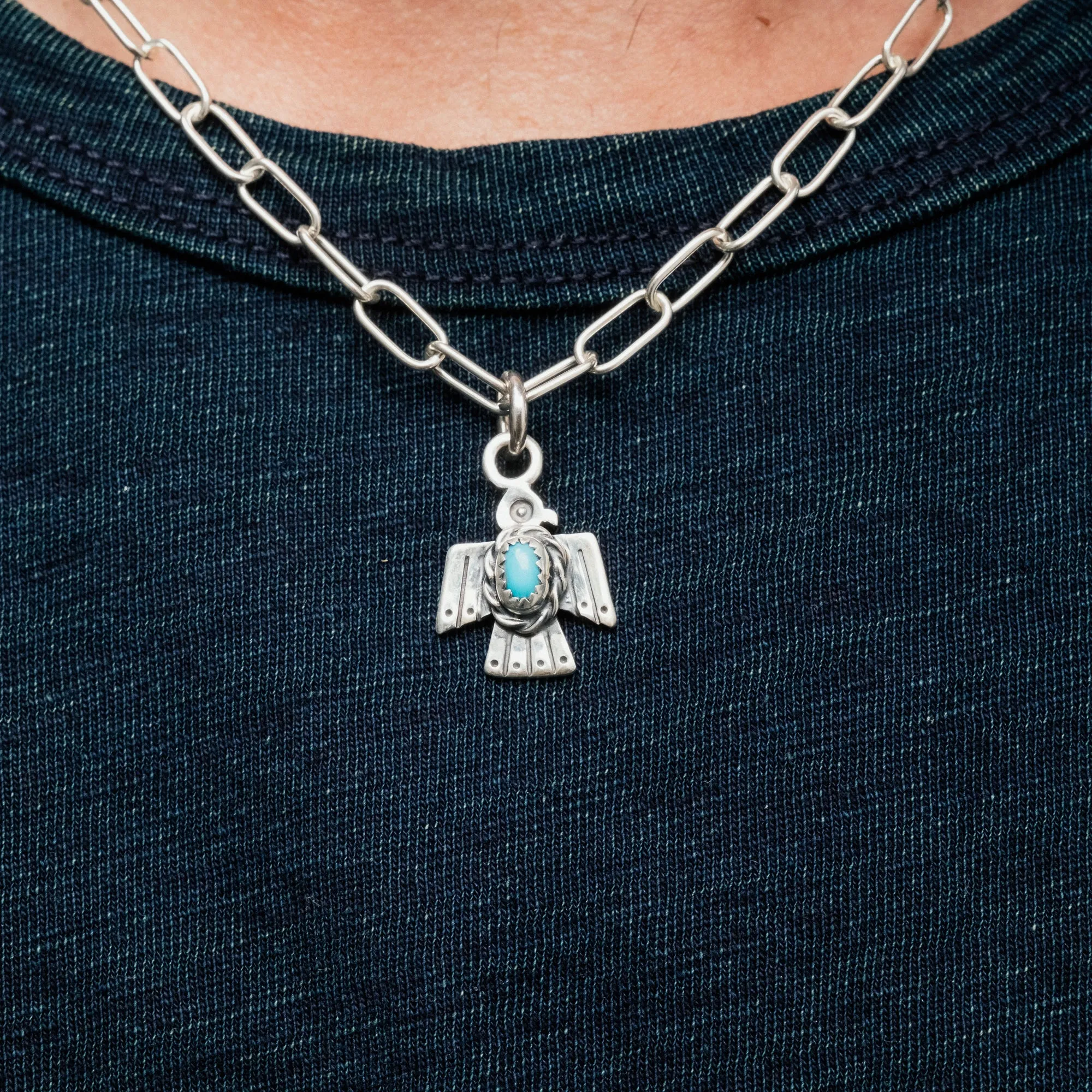 The Flat Head Thunderbird Pendant with Turquoise